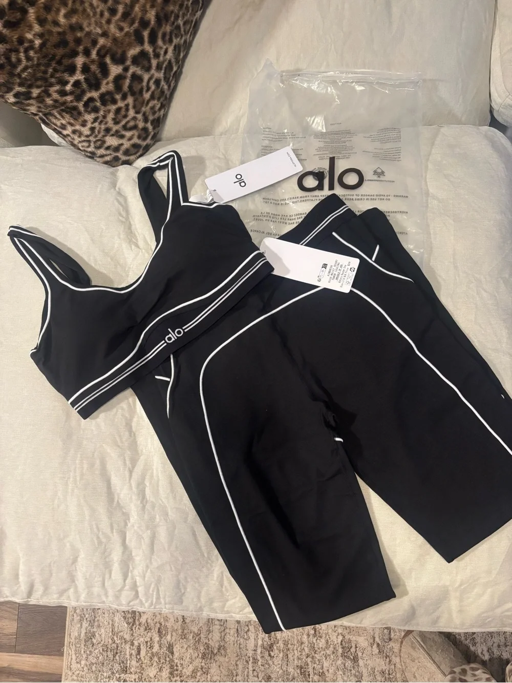 ALO Yoga Black Airbrush Heart Throb bra and matching leggings